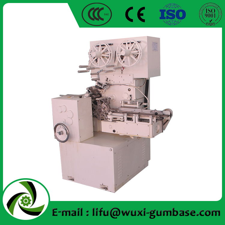 cutting and folding or twisting packing machine